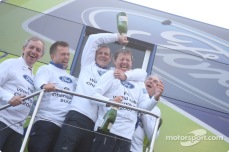 Malcolm Wilson doused in champagne